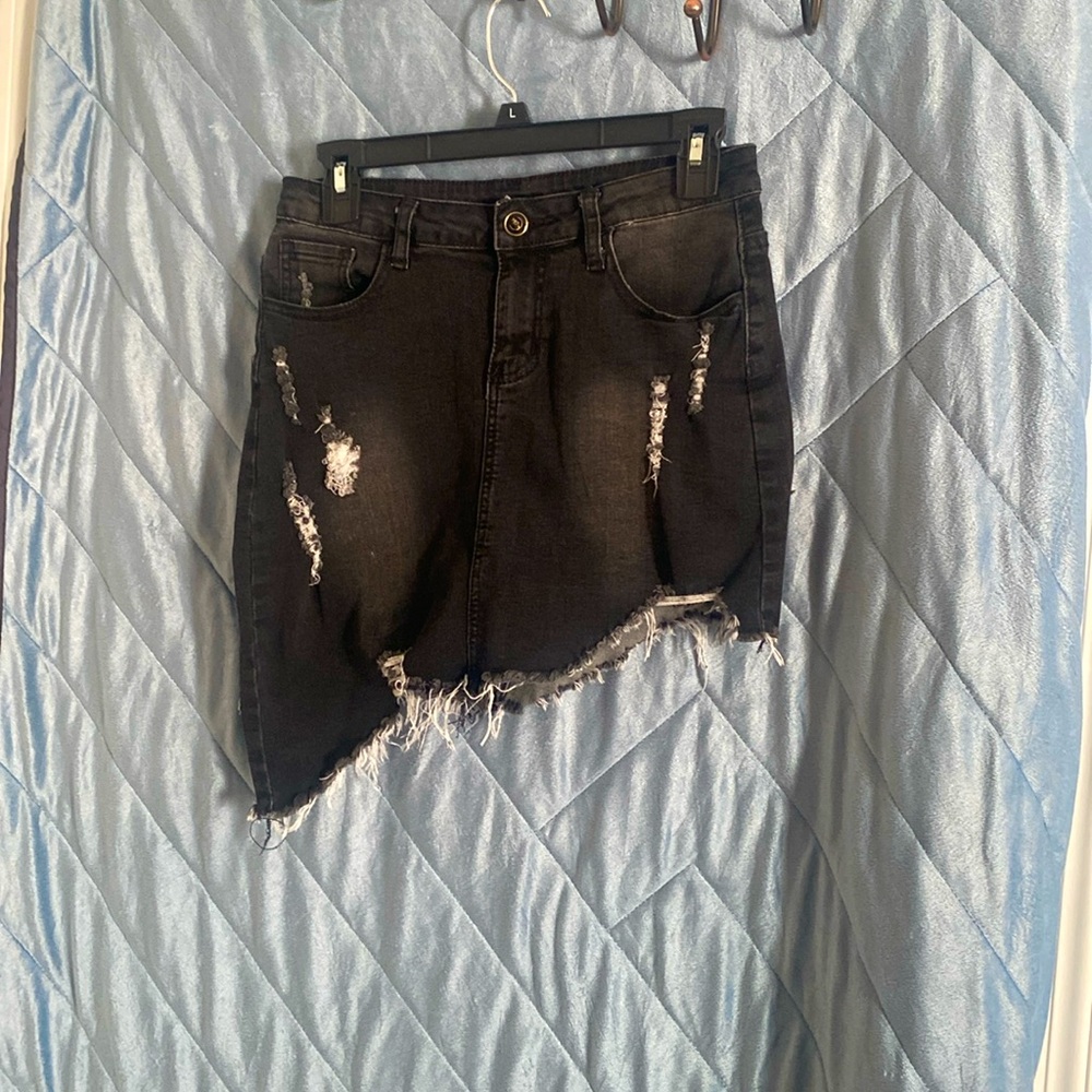 Like new! Black denim mini skirt, size medium.